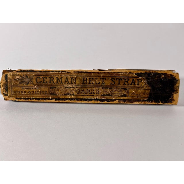 Antique Barber Razor Strop for your consideration. The strop measures approx. 12 1/4 inches long, 1 5/8 inches wide and...