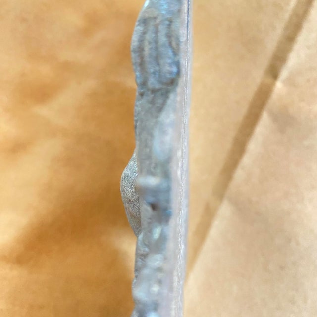 Metal figure of Lady Virgo. Two screw holes to mount on a piece of furniture or wall.