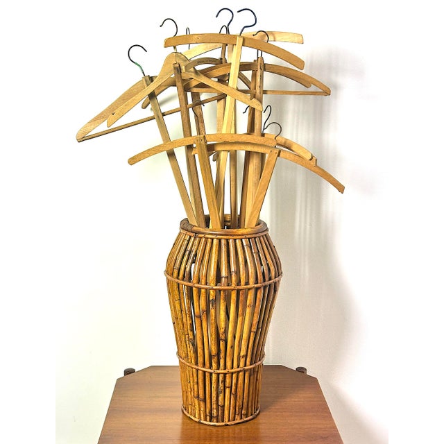Elegant vintage umbrella stand handcrafted in Italy between the 1950s and 1960s. Featuring a refined structure of vertical...