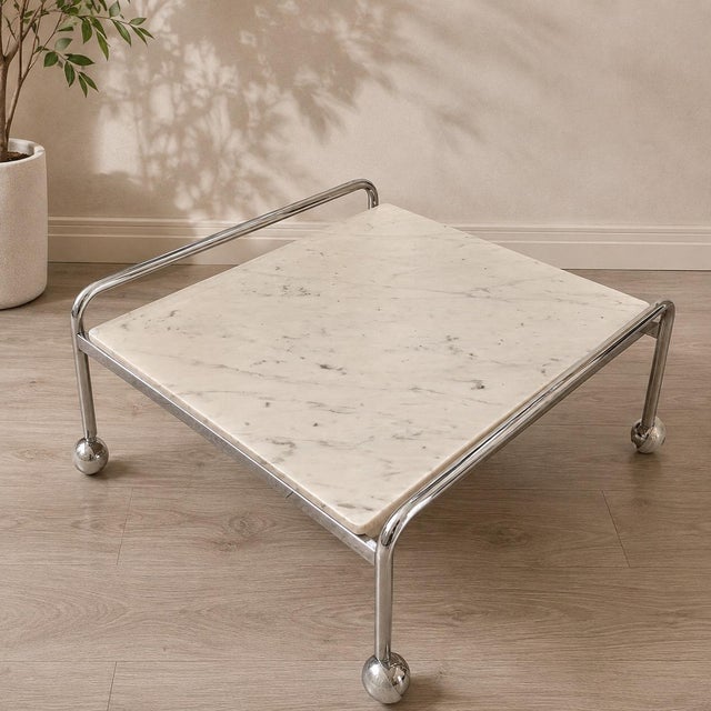 An authentic, single-owner "Karin" coffee table, designed by the iconic Bruno Mathsson for DUX. Originally purchased in...