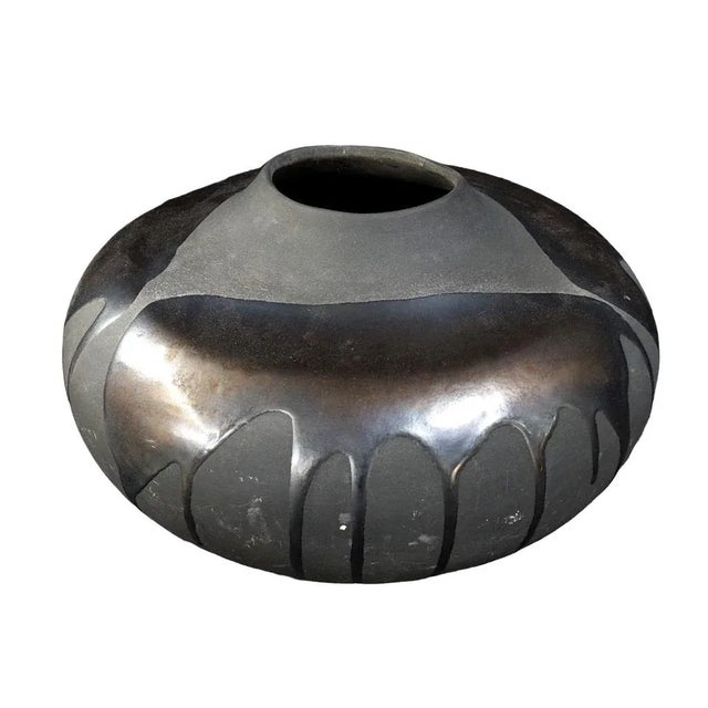 80s ceramic vase with drip paint. Wonderful modern color and selection of base. The base is an aluminum painted in bronze...