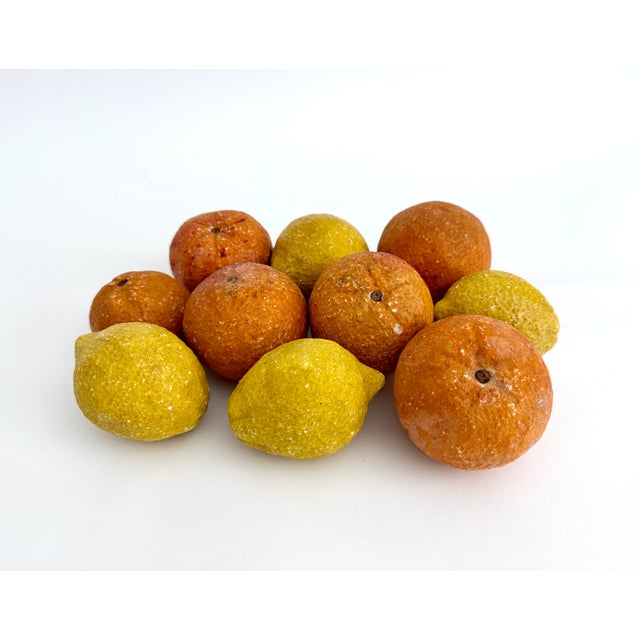 Hand-crafted in Italy during the mid-20th century, his coordinated citrus set features six oranges and four lemons. Each...