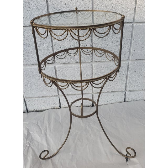 Hollywood Regency Gilt Metal Ornate and Glass Top Candle Stand or Plant Stand. Clean vintage condition. Measure 15" x 15"...