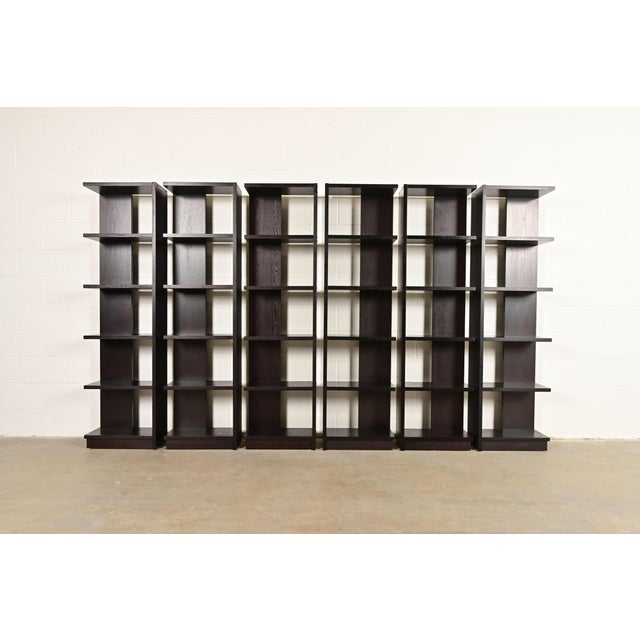 A gorgeous set of six Modern Art Deco style dark oak modular bookshelves, étagères, or display units In the manner of...