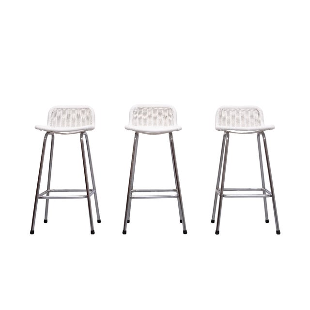 Very nice set of Three Rattan Bar Stools ,chrome tube legs . comes with a Rattan seat and backrest .Manufactured by Rohe...