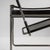 The legendary Wassily Lounge Chair by Marcel Breuer, in black leather, manufactured by Knoll—a pair in beautiful condition...