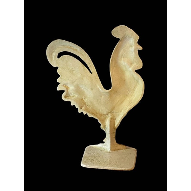 Unique Rooster doorstop with lip that fits under the door so it lays flat against the door while in use. No more stubbed...