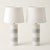 Pair of vintage ceramic striped lamps with white shades. 5”x26”