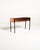 Rectangular copper sheet planter supported by a thin black-painted metal frame. Scandinavian production, 1960s. This...