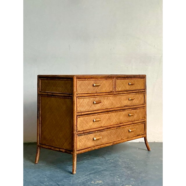 This sophisticated pair of vintage chest of drawers offers rich texture and tropical refinement, perfectly suited for...