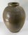 We are selling this large decorative Olive green glazed pottery vessel. This Chinese or South East Asian Martaban type...