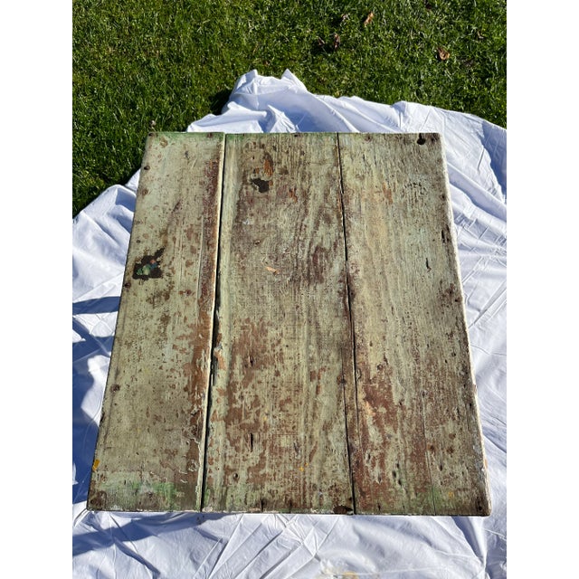 A single rectangular shaped wood table with plank top, one drawer, and turned legs. Features a white painted finish with...