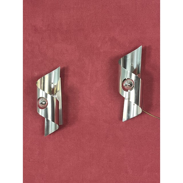 Set of 2 Mid-century steel wall lamps, 1960s Detailed and beautiful, they are functional and in good condition. European...