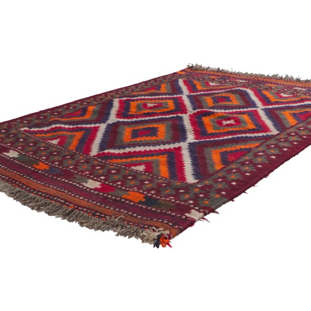 61094 Vintage Persian Shiraz Kilim Rug with Tribal Style 03'08 x 05'07. Full of tiny details and tribal style, this hand-...