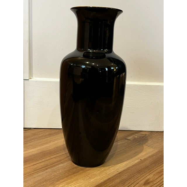This is a vintage Japanese black porcelain vase featuring hand-painted floral motifs and gold accents. Made in 1950's-1960's