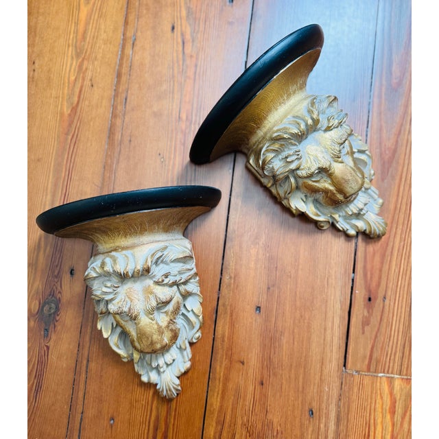 Roar!! A pair! Lion head wall sconces-shelves. These are such a stunning set with the black and gold details. Measuring 9...
