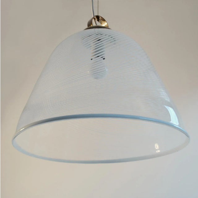 Large and exquisite blown crystal clear Murano glass dome shape lampshade decorated with spiraling white stripes of using...