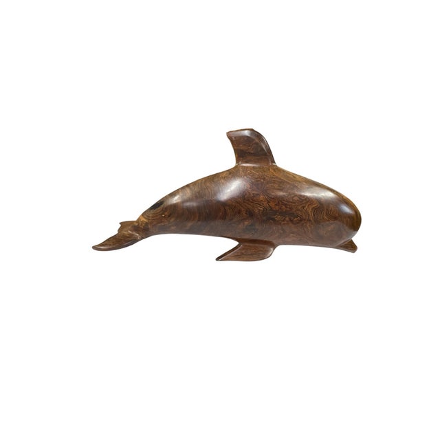 Vintage hand carved of beautiful burlwood coastal dolphin. Great bookshelf, tabletop decor. Measures 19”w x 4.5” d x 8.5” h.