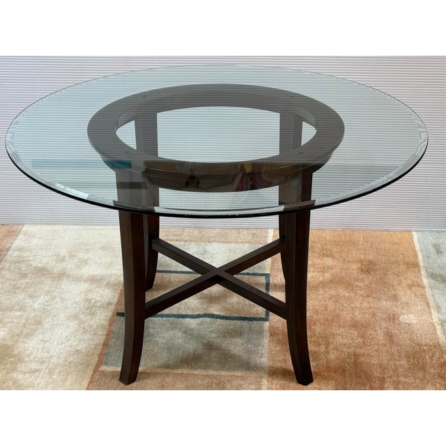 Design Plus Gallery presents the Halo Dining Table by Crate & Barrel. A clear round glass top with a polished, reverse-...
