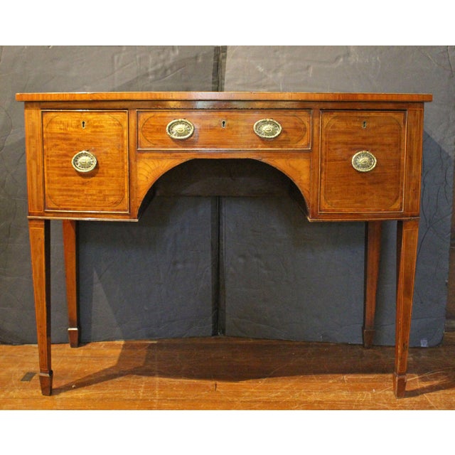 Circa 1780 George III Brandy Board or Small Sideboard, English. Mahogany & mahogany veneers with superb shell scrolled...
