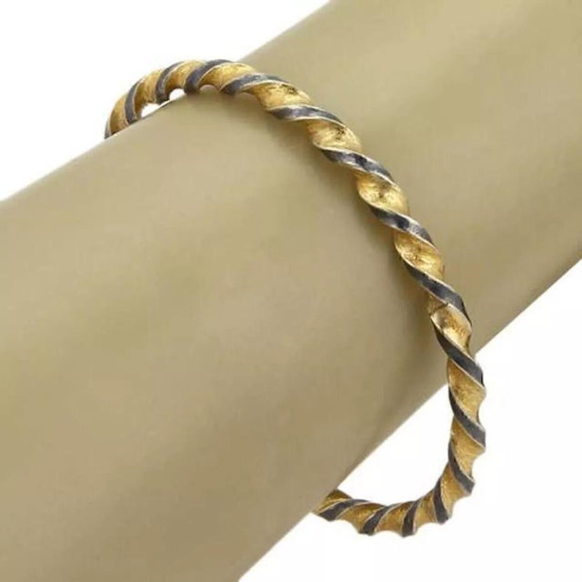 This is a lovely authentic bangle by Gurhan from the MIDNIGHT collection, it is crafted from darkened sterling silver and...