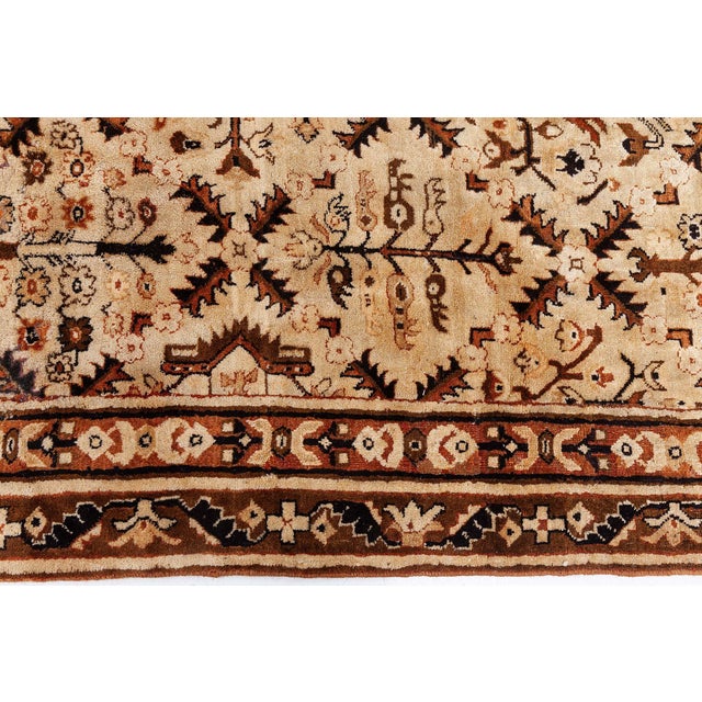 This antique Indian Agra rug (size adjusted), dating from the Early 20th Century, displays an exceptionally intricate and...
