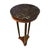 A slim, well-proportioned pedestal stand in the Neoclassical manner, topped with a dramatic black marble slab shot through...