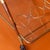 A Mid-Century Modern Italian folding bar trolley, designed in the style of Cesare Lacca and Ico Parisi during the 1950s....