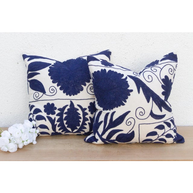 This magnificent pair of decorative pillows is a true artifact of Central Asian artistry. Each square pillow is crafted...