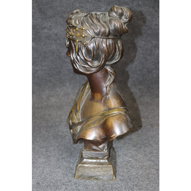 An exceptional and beautifully executed French Art Nouveau bronze bust entitled Hérodïade (Herodias), signed by the French...