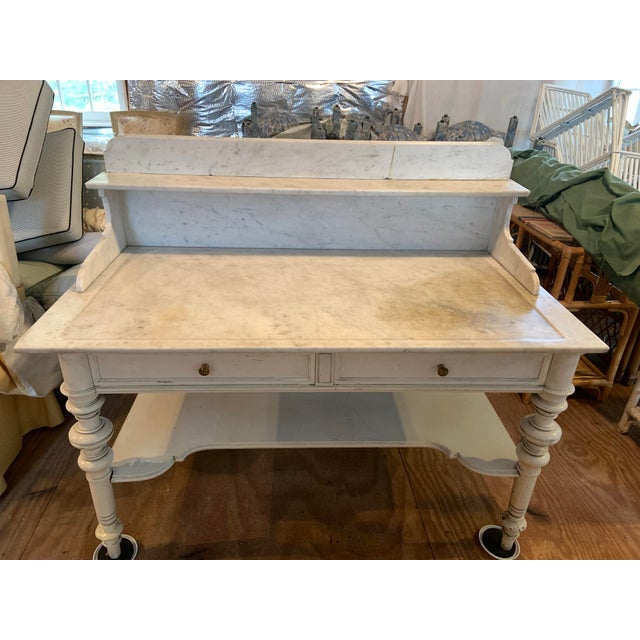 Large vintage 19th Century French (Napoleon 3rd style) wash table or coiffeuse with white Carrara marble top. Base has...