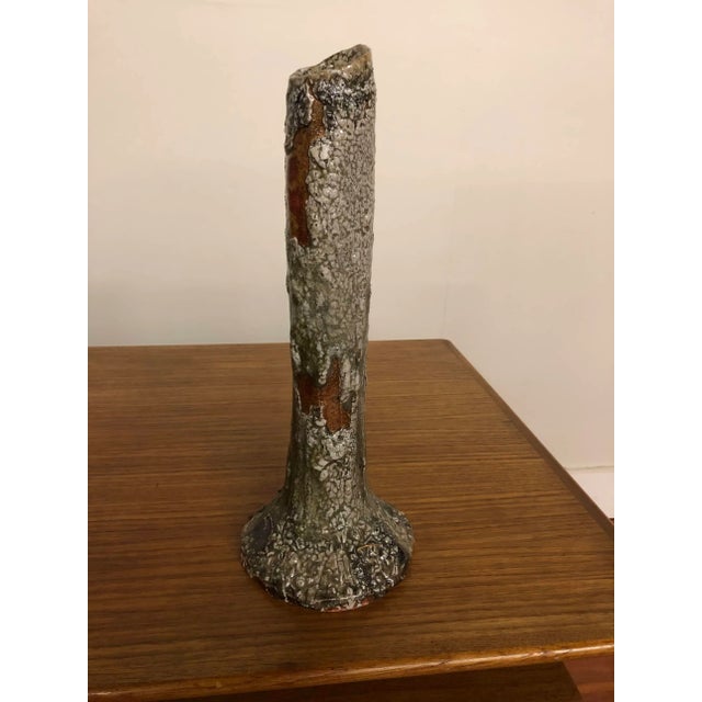 Shino glazed ceramic vase with lots of visual interest, by a long time Seattle ceramic artist. He told us that it was...