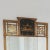 This amazing large wall mirror is by Friedman Brothers Co. The gilded wood frame has a Chinoiserie design with a pagoda...