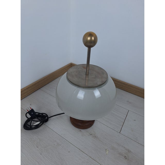 Alfa Model First Series Table Lamp with Wooden Base by Sergio Mazza for Artemide, 1960s, in Very Good conditions. Designed...