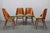 This elegant set of four mid-century dining chairs, model ton 514, was designed by osvald haerdtl and produced by ton in...