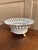 A gorgeous white & gold regency style reticulated porcelain lion paw footed basket compote Portugal, Circa late 20th...