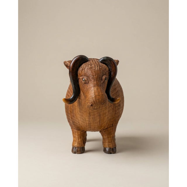 Bring a little unexpected charm home with this vintage wicker buffalo figurine. Handwoven with beautiful texture and warm...