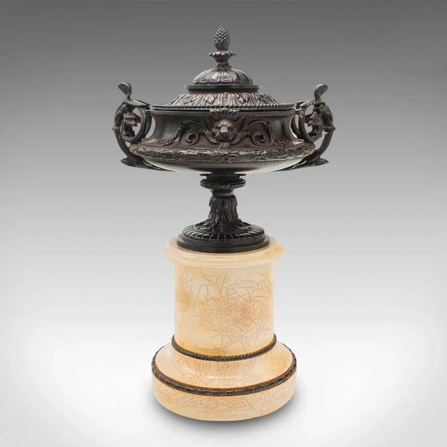 This is a vintage neo-classical urn. A Continental, Bakelite decorative ornament in Grand Tour taste, dating to the early...