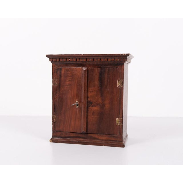 Antique miniature furniture in oak with hand-forged fittings from the 1840s. Unique and decorative collector’s item with...