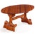 A sculptural wood trestle dining table accompanied by 6 side chairs. The organic form blend elements of Art Nouveau and...