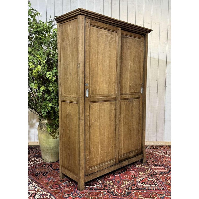 Oak wardrobe with sliding doors from the 1930s - H=2m, D=51cm, W=1m31.