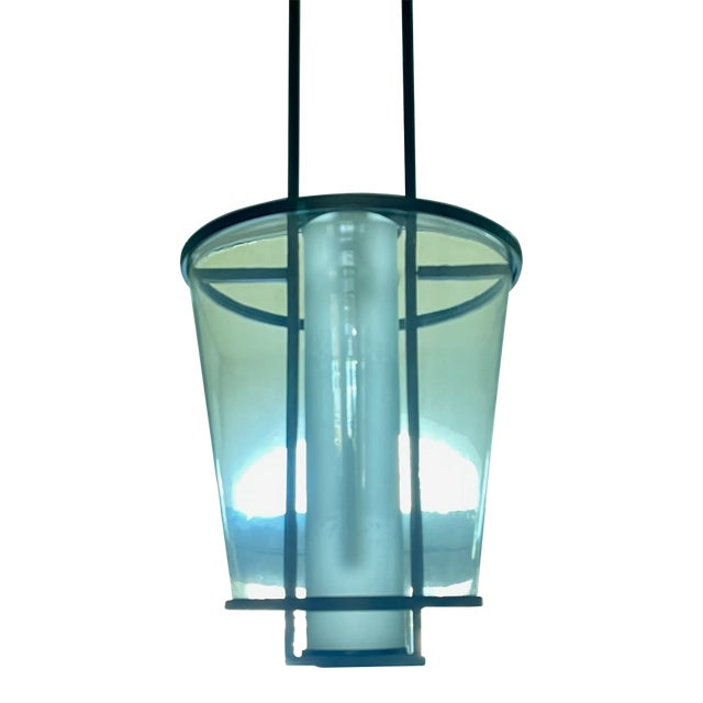 Kevin Reilly's Lucern Hanging Light was inspired by the Swiss lake of the same name. Art Deco with a contemporary profile....