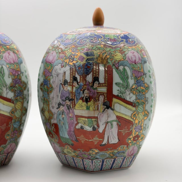 Add a touch of timeless elegance to your home with this stunning matching pair of Chinese Famille Rose Medallion 12" tall...