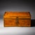 Small Biedermeier casket with framed burl veneer panels. with brass side handles and lock with key. The interior is paper-...