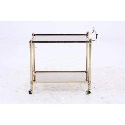 Wonderful vintage glass trolley from the 60s FEATURES * High-quality workmanship * with wheels * 2 glass shelves * Vintage...