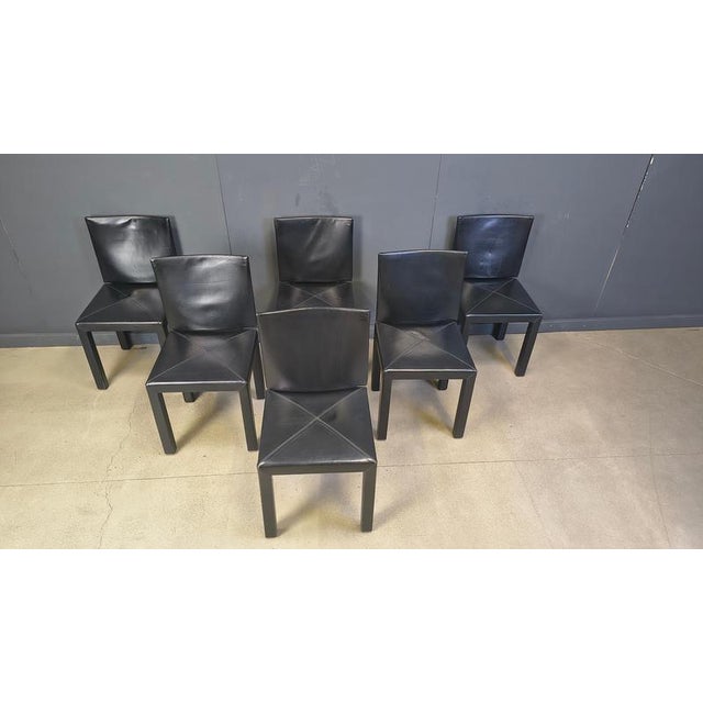 Set of 6 Arcadia dining chairs designed by Paolo Piva for B& B italia's Arcadia series. Upholstered in black leather. They...