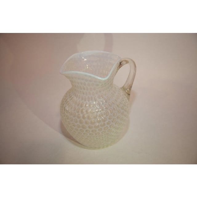 Windows honeycomb pattern in a stunning transparent opalescent, applied transparent handle with pressed-feather design to...