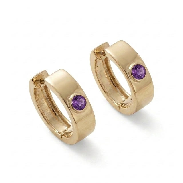 Introduce a touch of regal charm to your daily look with these modern, sophisticated huggie hoop earrings. Precision-...