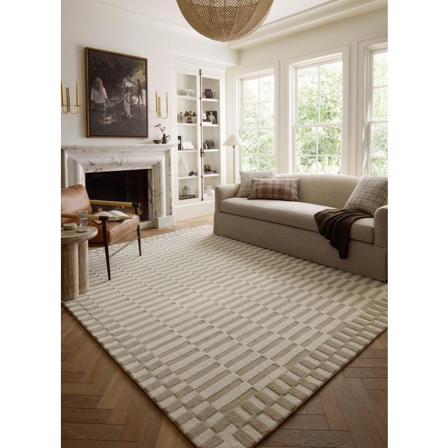 The Bradley Collection from Chris Loves Julia x Loloi takes the classic striped rug to new heights. This hand-tufted, 100%...