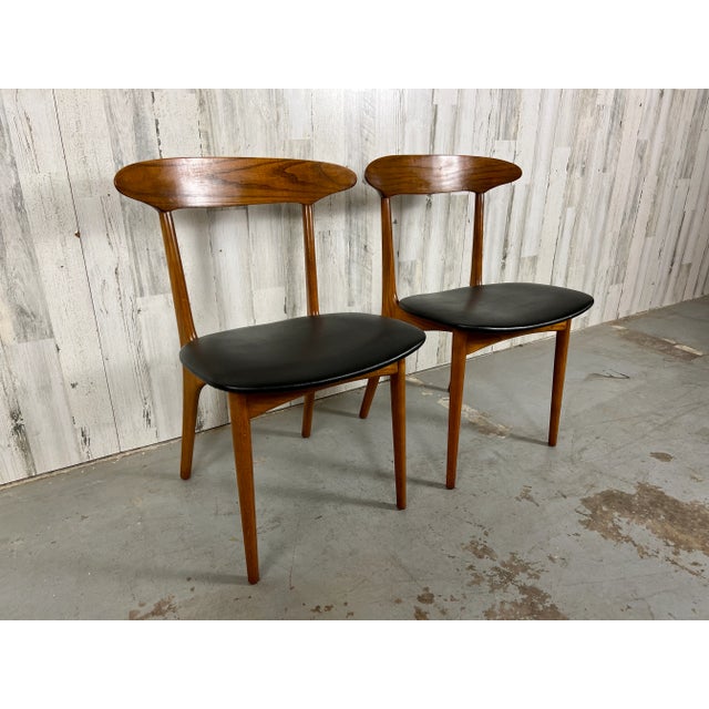 Kurt Østervig Chairs for Brande Møbelindustri Solid teak with original black vinyl. The curved back makes these very...